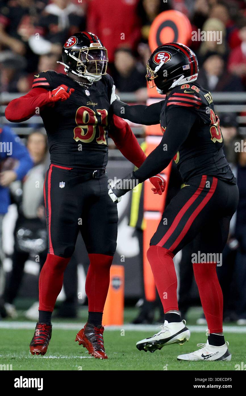 San Francisco 49ers defensive tackle Sam Okuayinonu (91) and defensive ...