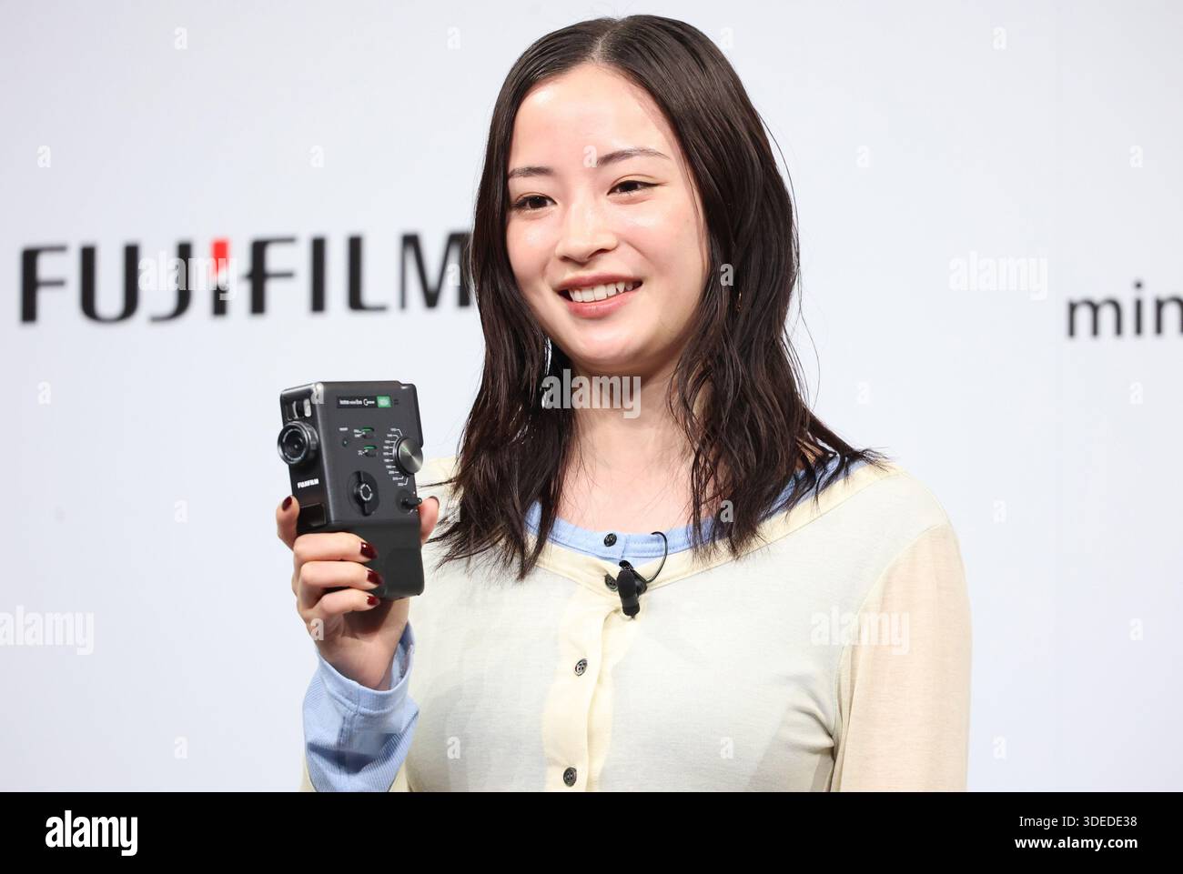 Tokyo, Japan. 7th Jan, 2026. Japanese actress Suzu Hirose attends a promotional event of Fujifilm's hybrid instant camera 'instax mini Evo Cinema' which will go on sale from January 30 in Tokyo on Wednesday, January 7, 2025. The new 'instax mini Evo Cinema' can take instant pictures and also take maximum 15-second short movies with retro 8mm movie camera style body. Users can play captured movies with QR code printed on the instant picture. (photo by Yoshio Tsunoda/AFLO) Stock Photo