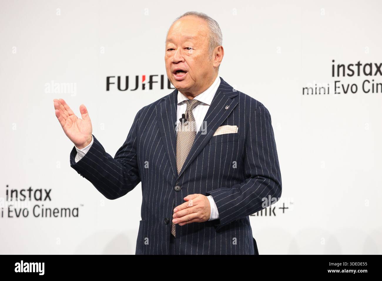 Tokyo, Japan. 7th Jan, 2026. Japan's Fujifilm president Teiichi Goto announces to launch the company's new hybrid instant camera 'instax mini Evo Cinema' which will go on sale from January 30 in Tokyo on Wednesday, January 7, 2025. The 'instax mini Evo Cinema' can take instant pictures and also take maximum 15-second short movies with retro 8mm movie camera style body. Users can play captured movies with QR code printed on the instant picture. (photo by Yoshio Tsunoda/AFLO) Stock Photo