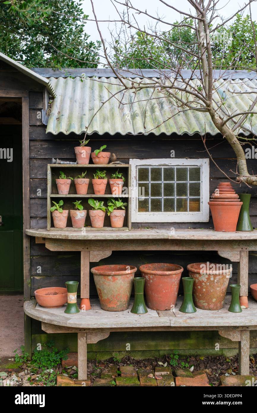 Terracotta pot collection, stacked and organised to show different sizes, types and makes Stock Photo