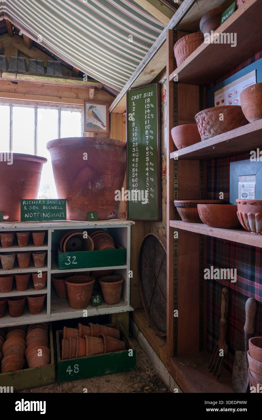 Terracotta pot collection, stacked and organised to show different ...
