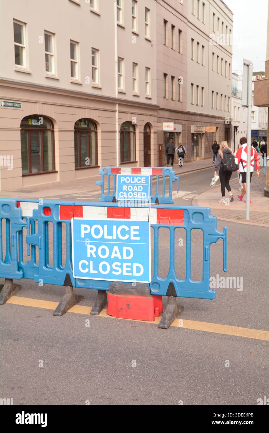 Police Road Closed signs for a public running event Stock Photo