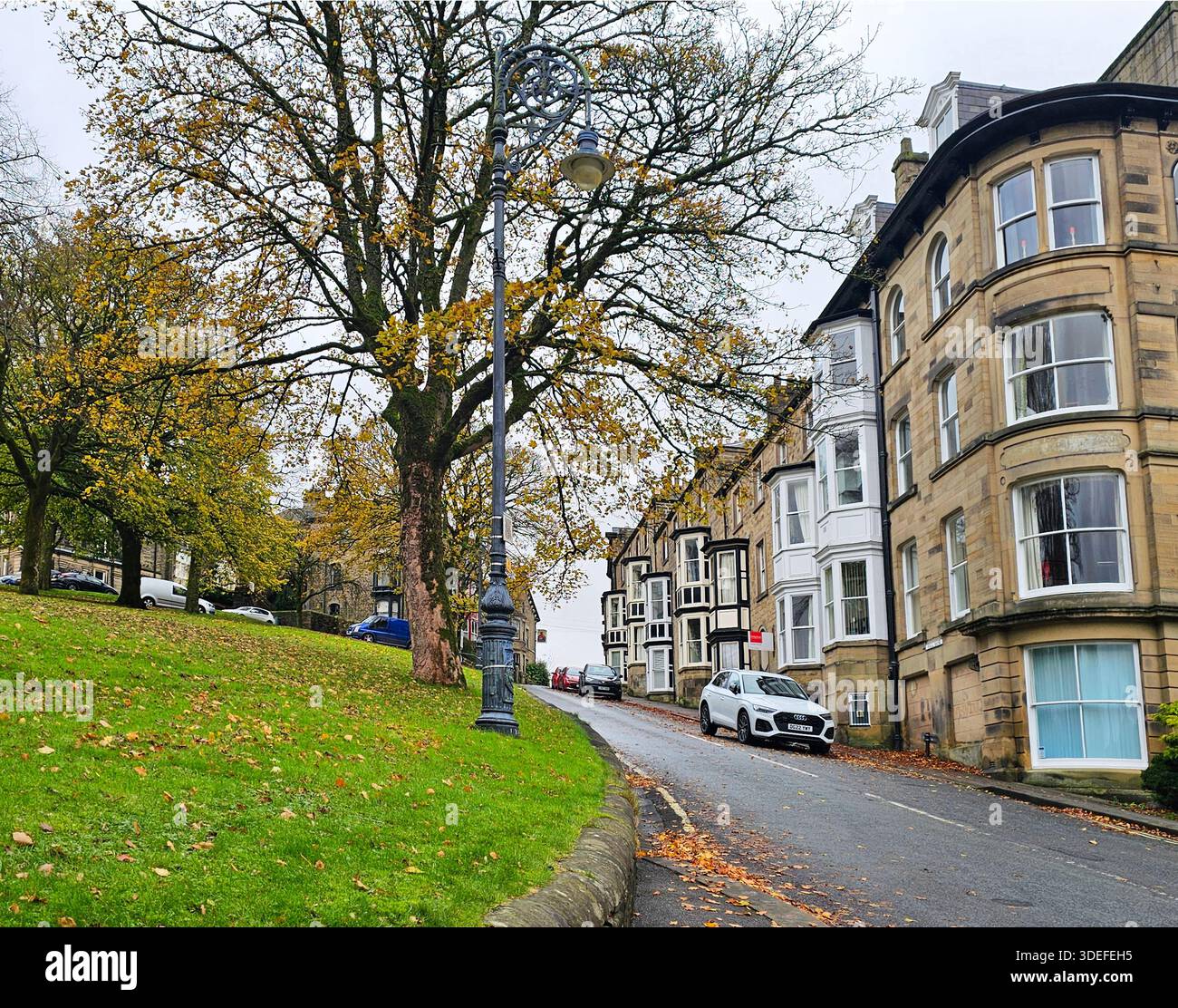 Hall Bank, Buxton, Peak District, Derbyshire. A steep street in Buxton town centre, beside The Slopes Park. - Smartphone Captured Stock Image