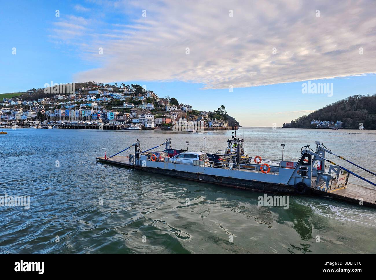 Lower Ferry, Dartmouth, Devon. The Lower Ferry is a barge steered by a tug that takes vehicles and passengers between Dartmouth and Kingswear. - Smartphone Captured Stock Image