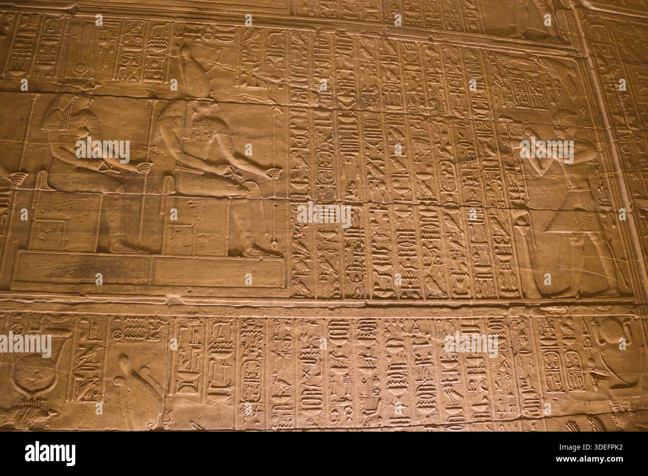 Wall Ritual Ceremonial relief with ritual scenes carved on the sandstone wall of ...