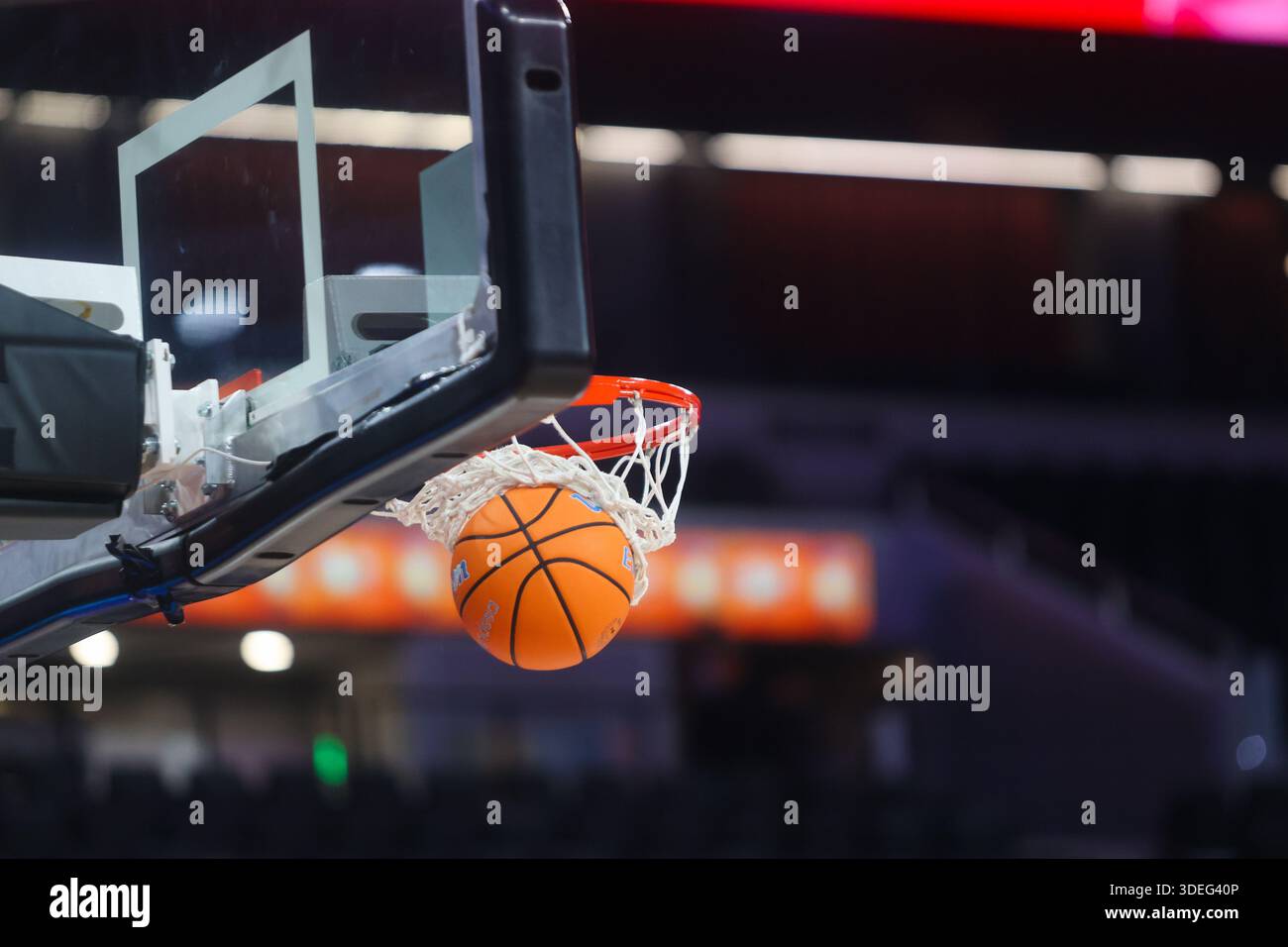 Basketball going into the hoop Stock Photo - Alamy