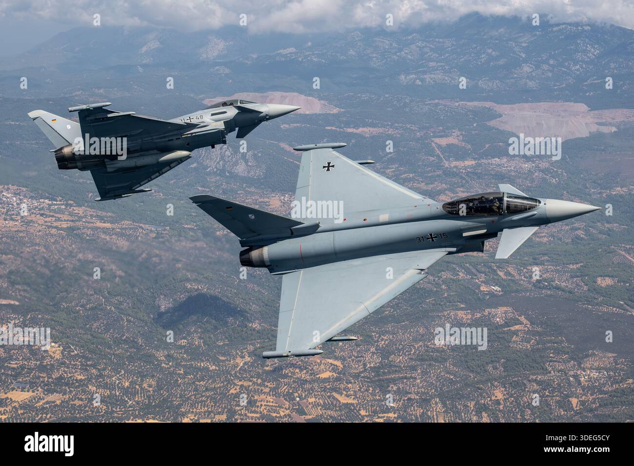 Air-to-air formation and banking maneuver of German Air Force ...