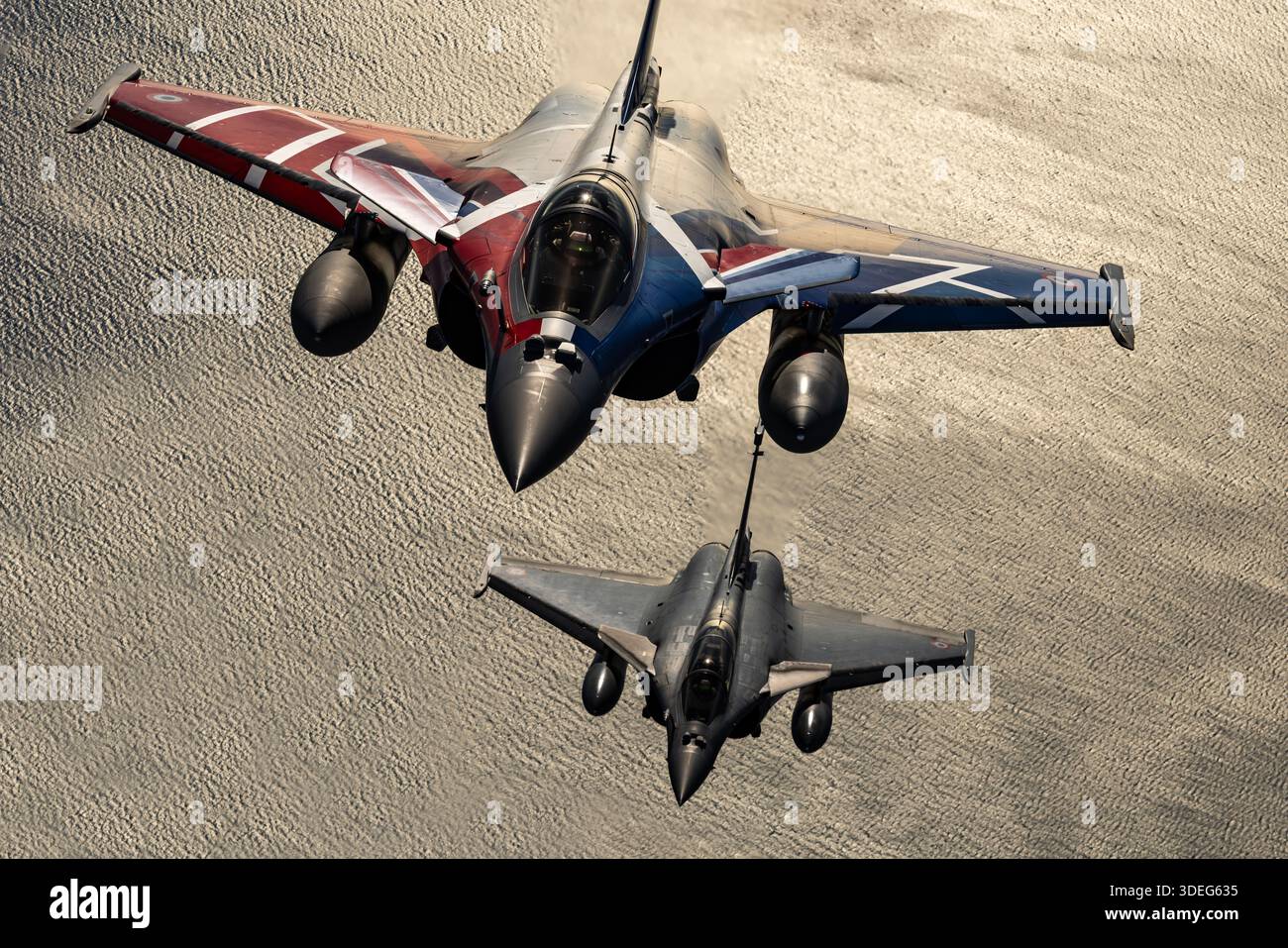 Air-to-air formation flight of two French Air Force Dassault Rafale ...