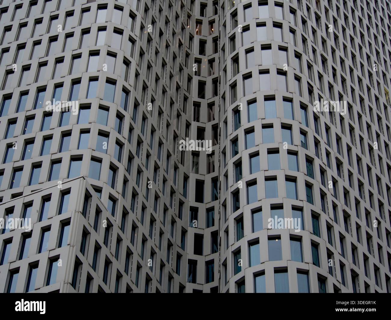 Abstract view of a modern high-rise building facade with repeating ...