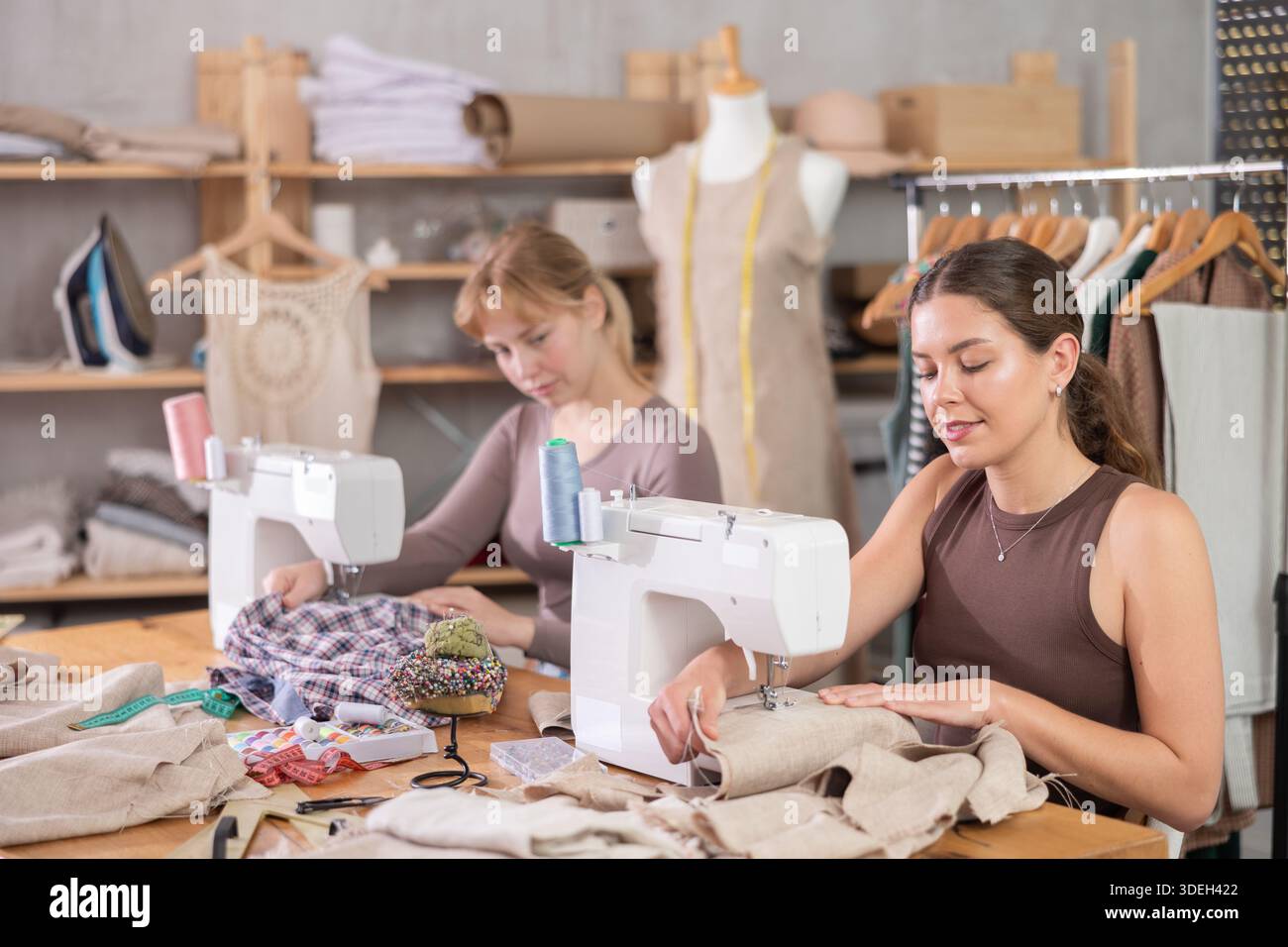 Two female tailors working in the workshop Stock Photo