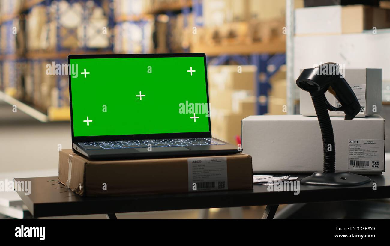 Order fulfillment modern desk with chroma key on a laptop in ...