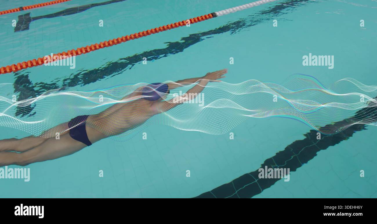 Pool Lap Rope Gliding swimmer wearing dark brief, cap in lap pool, passing orange ...