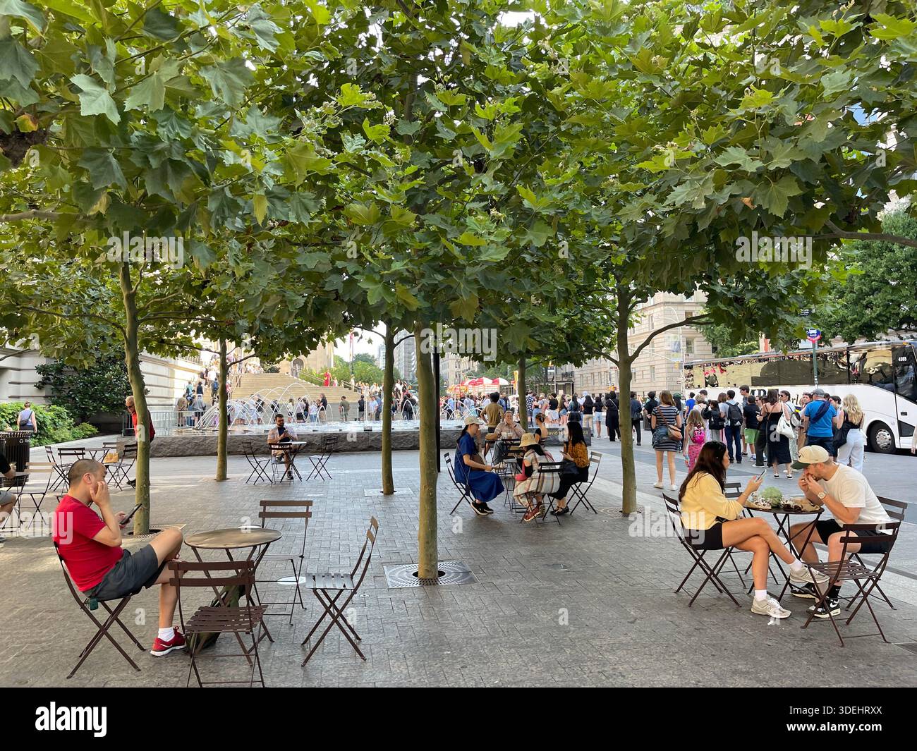 Spring energy flows through the streets of Manhattan, New York City. - Smartphone Captured Stock Image