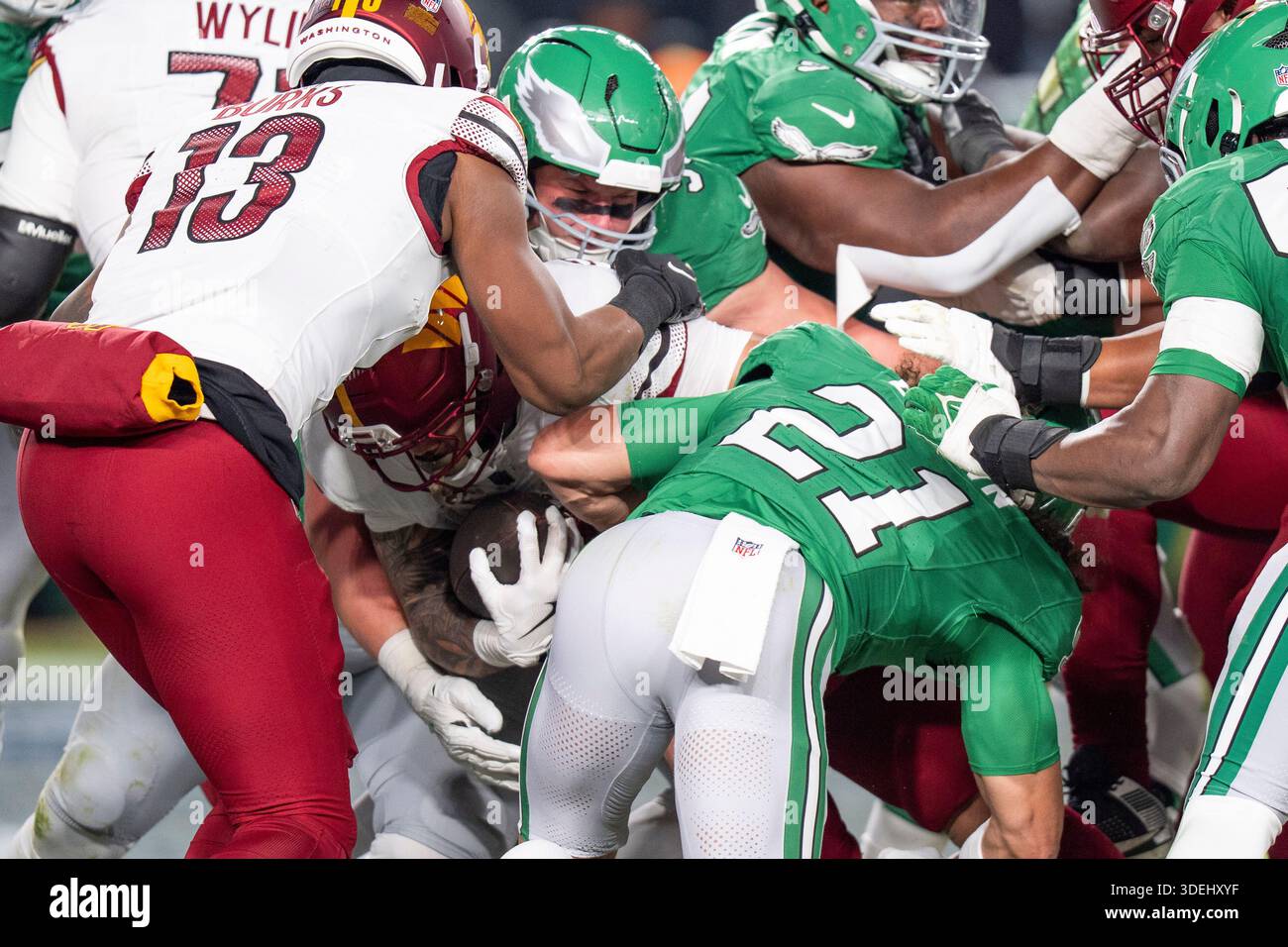 Washington Commanders running back Chris Rodriguez Jr., center left ...