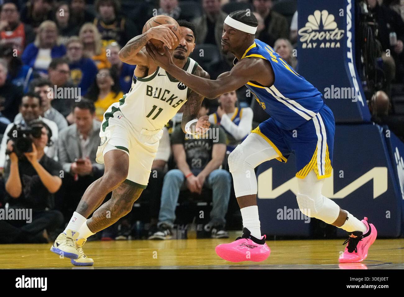 Milwaukee Bucks guard Gary Harris (11) reaches for the ball against ...