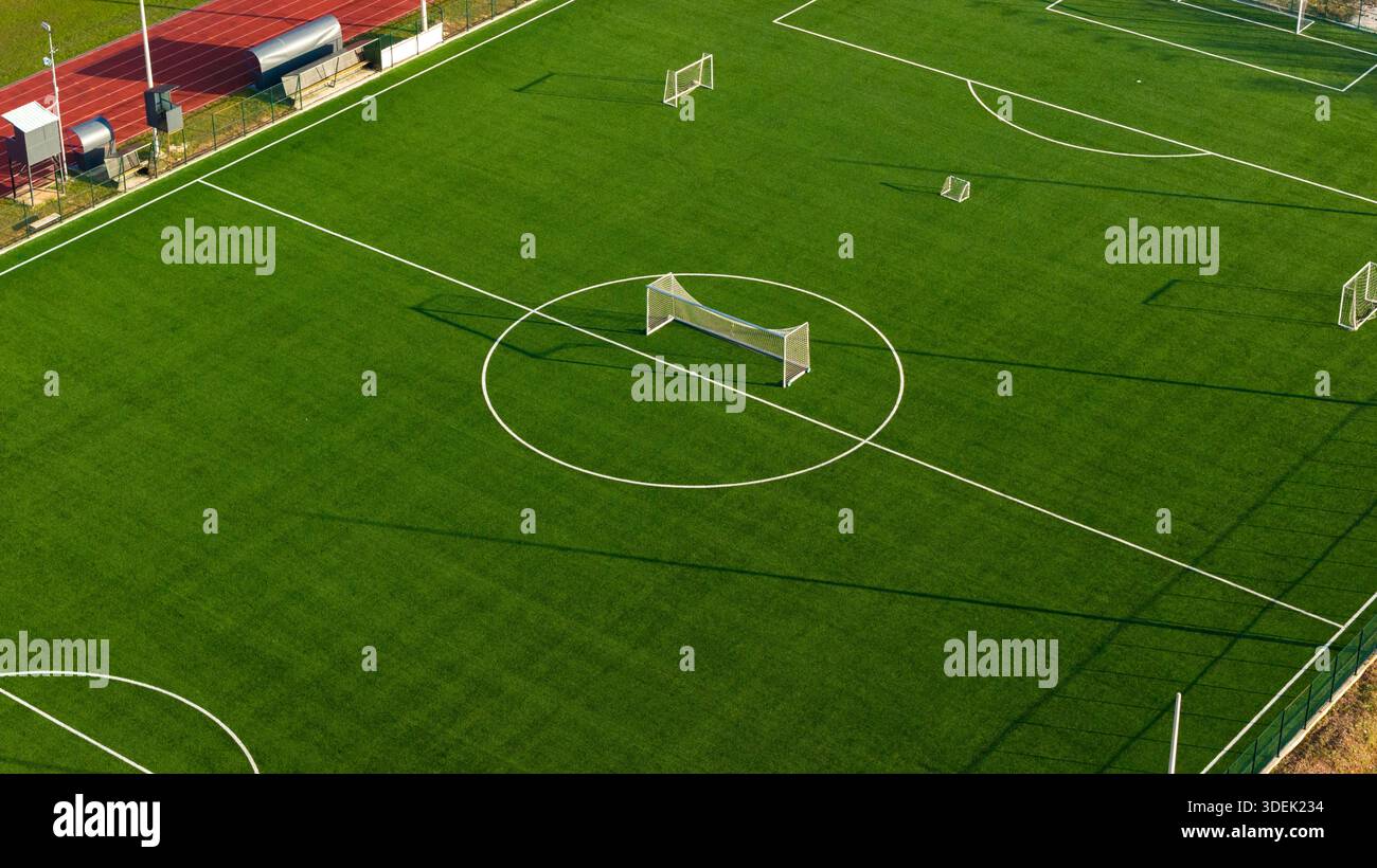 Wide aerial view of football training field with small goal on ...