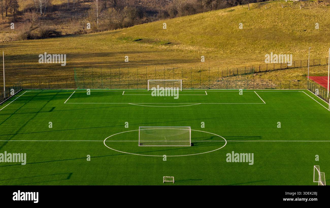 Top view aerial of football training pitch with artificial turf ...