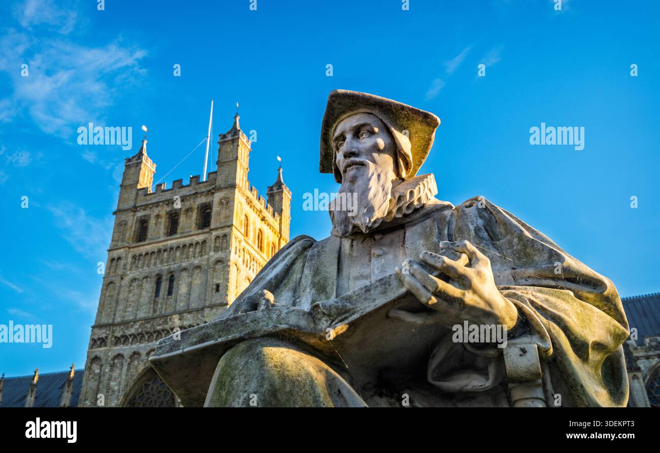 Statue (1907) by Alfred Drury of the influential theologian, Richard Hooker, on Exeter Cathedral Green, Exeter, Devon, England, UK. Stock Photo
