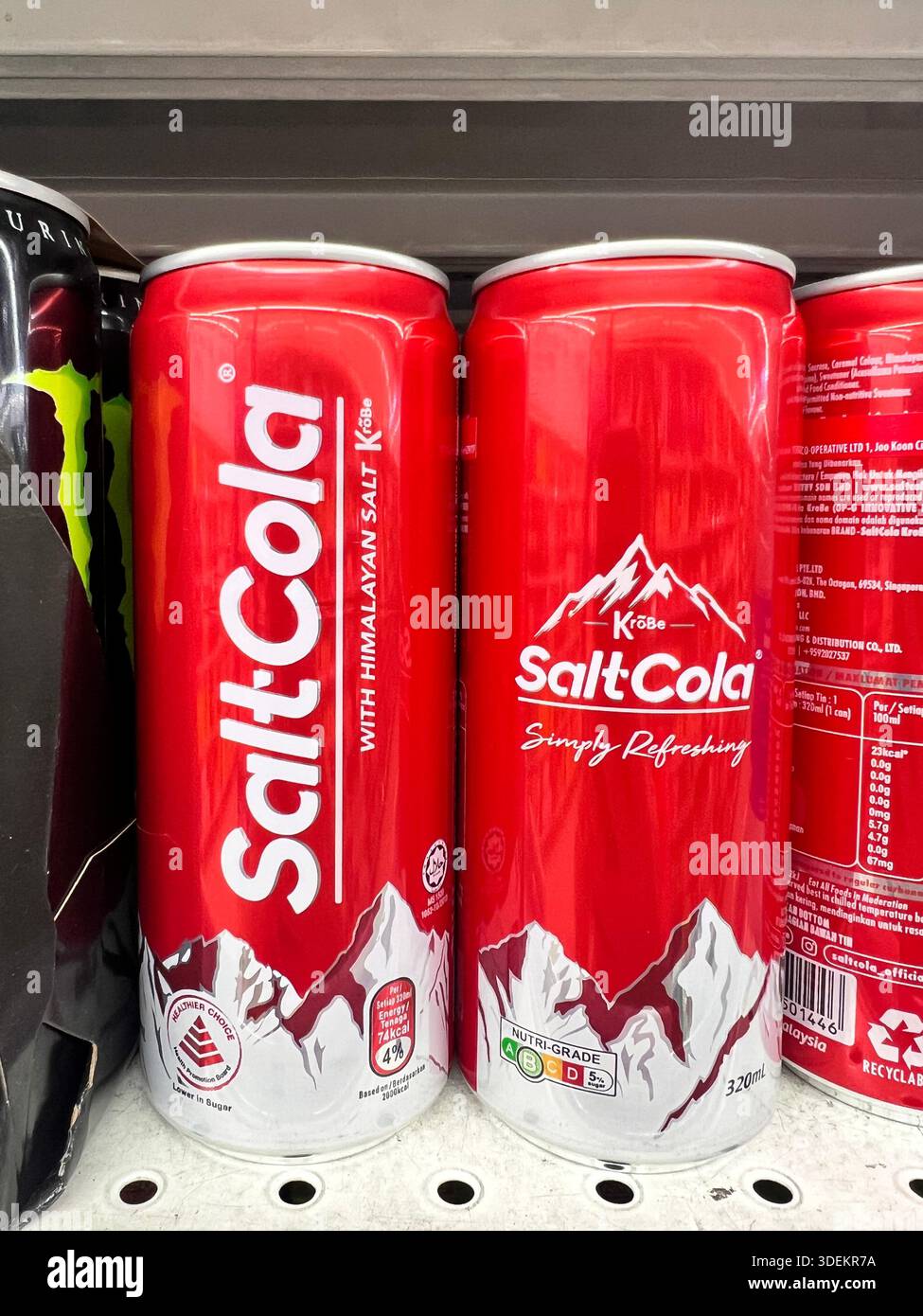Salt-Cola on display in a supermarket, with himalayan salt. Tagline simply refreshing. Nutri-grade in B, low sugar. Carbonated drinks - Smartphone Captured Stock Image