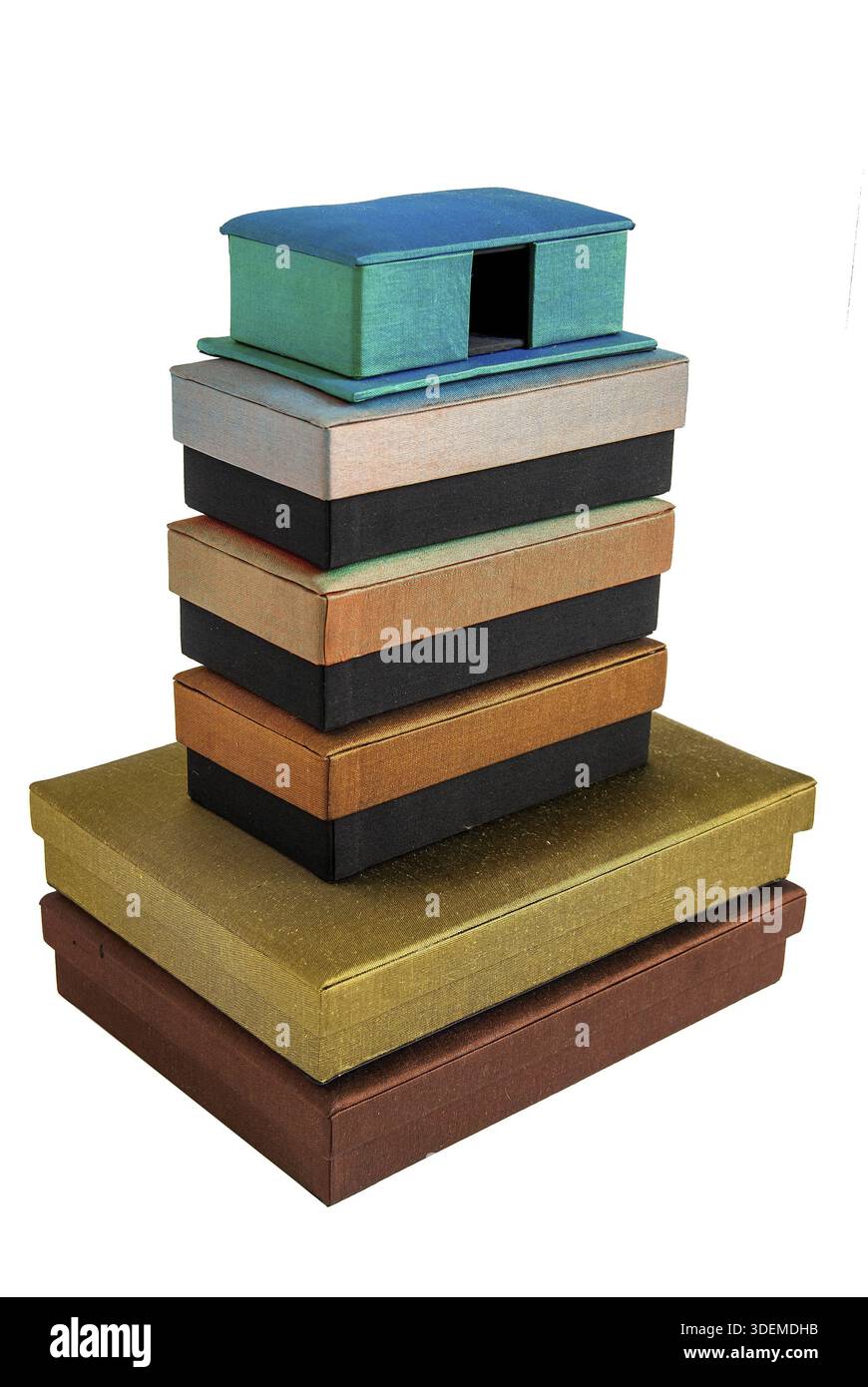 Stacked colored silk gift boxes isolated on white background Stock Photo