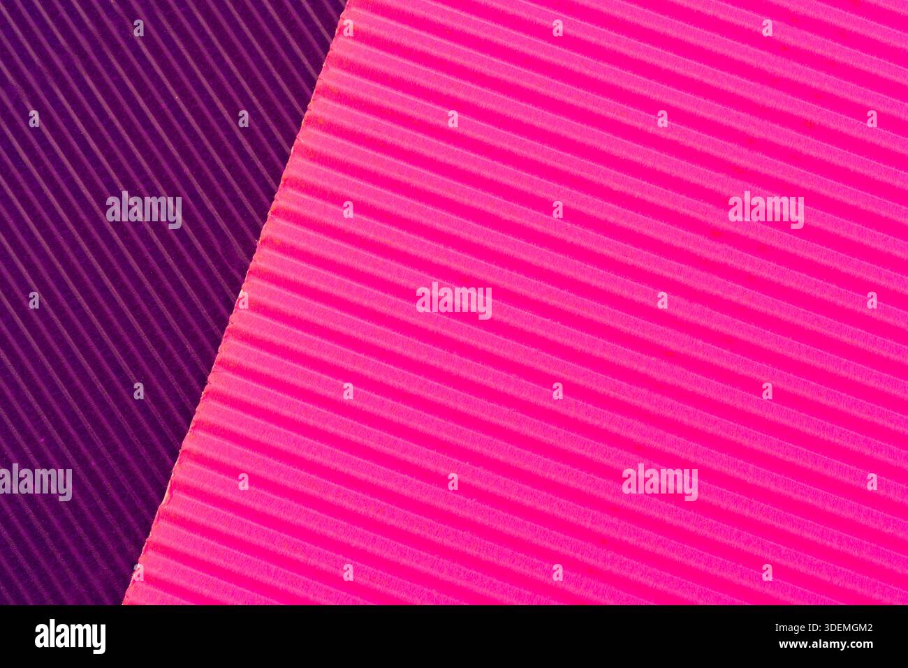 Abstract corrugated paper background. Rough decorative paper texture. Stock Photo