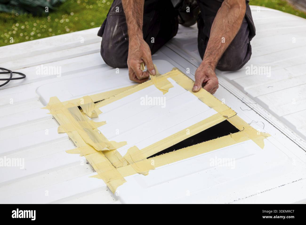 DIY Camper Jumper van conversion. new window outside. cutting with an ...