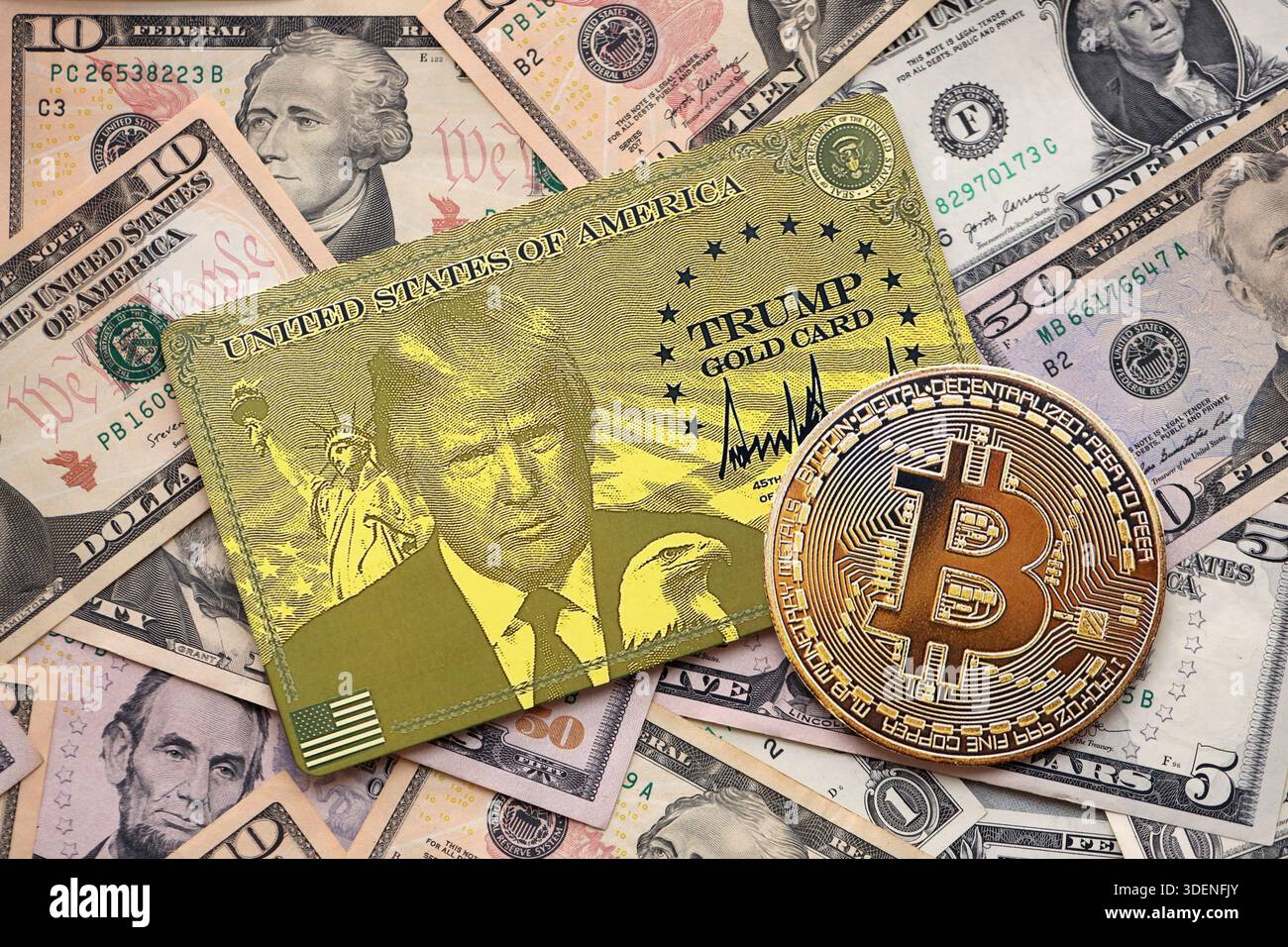 KYIV, UKRAINE - DECEMBER 13, 2025 Trump gold card and bitcoin on big amount  of US dollar money bills banknotes close up Stock Photo - Alamy