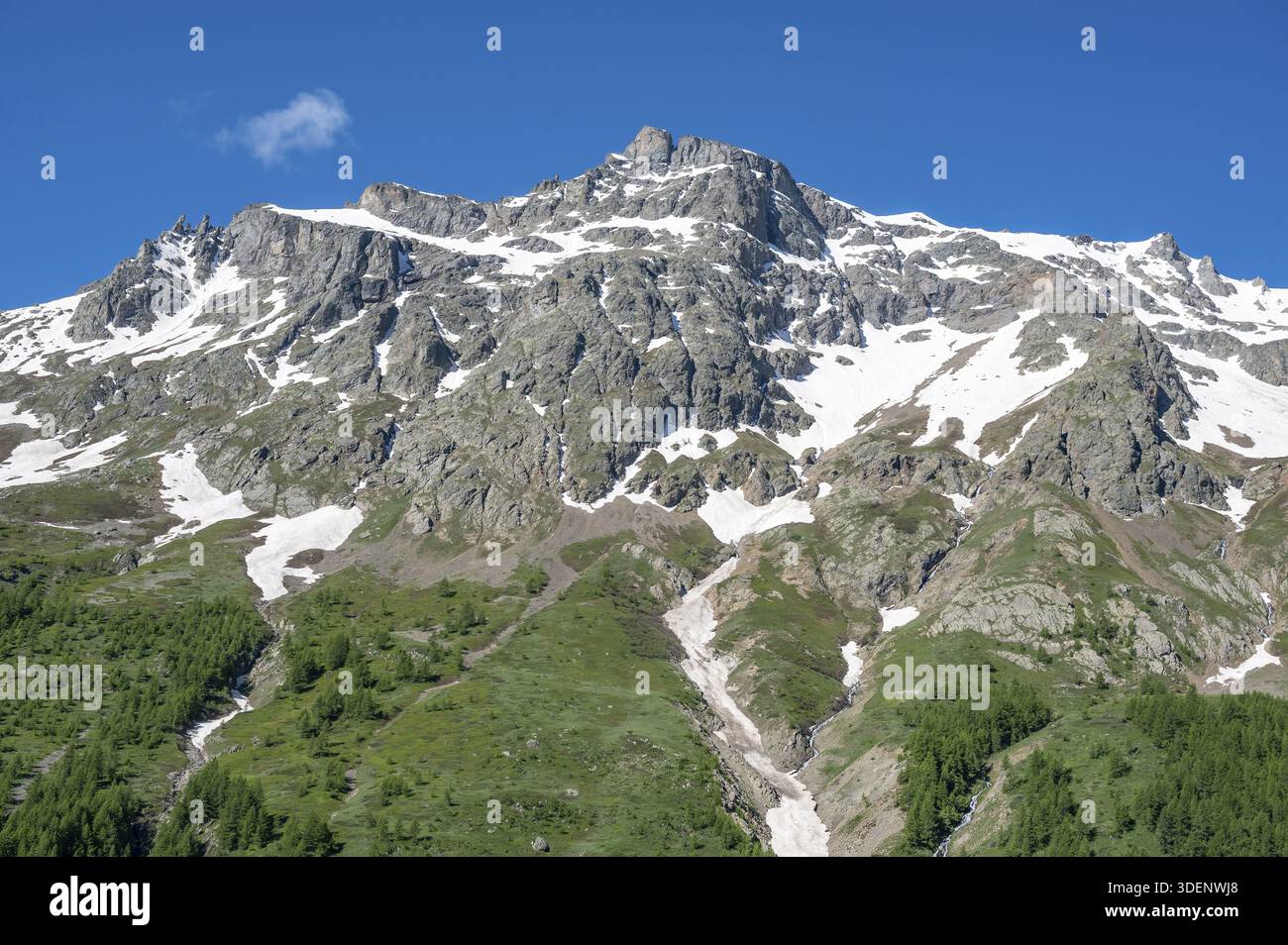 Detailed view of a massive, rugged rock face of the Ecrins massif with ...