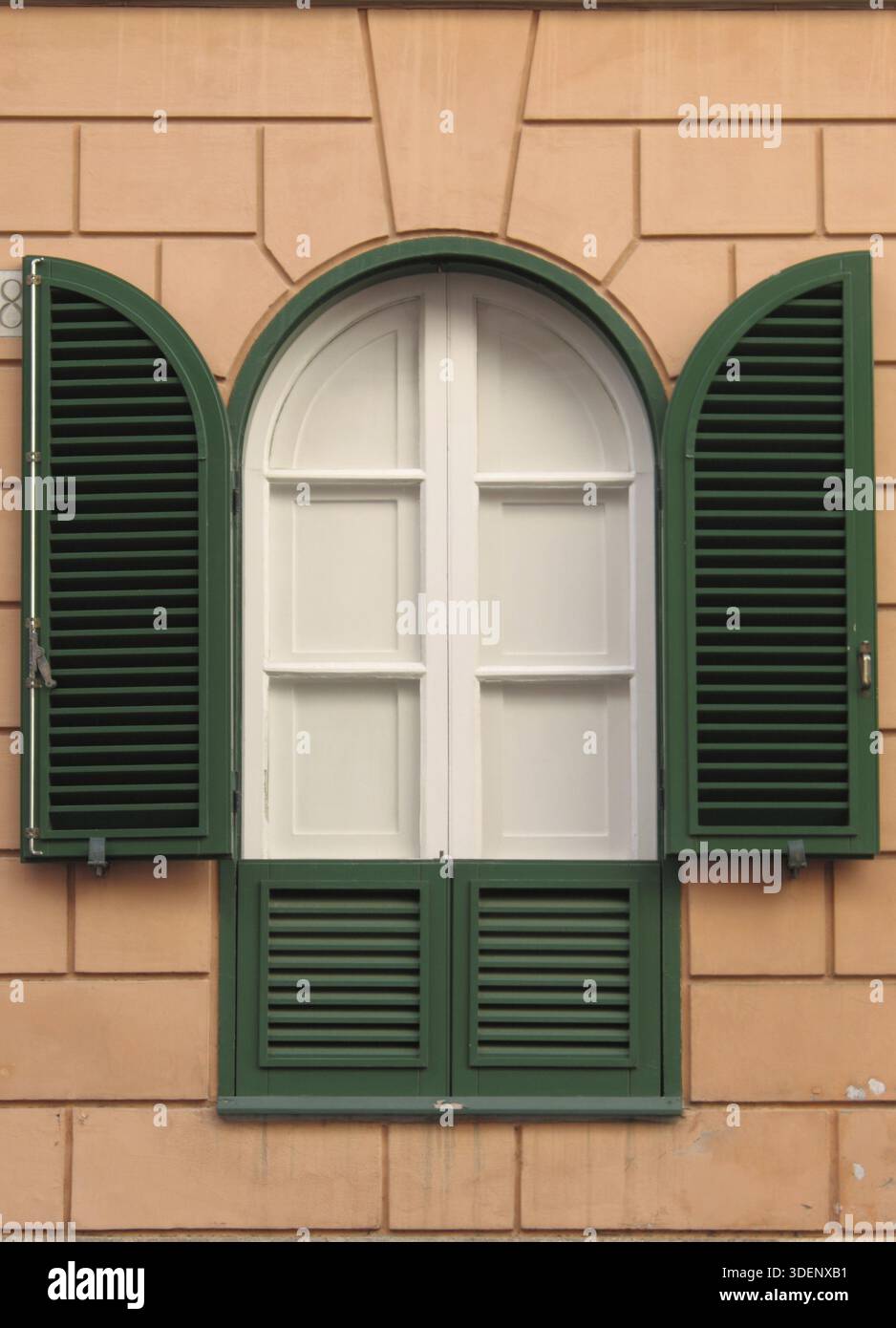 Renaissance window with arch and open shutters Stock Photo - Alamy