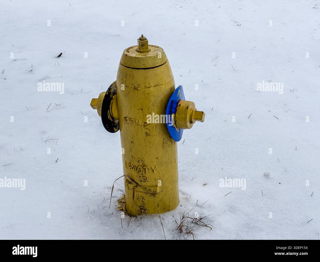 Fireplug Tool McAVITY fire hydrant. Hydrant, fireplug. Yellow utility fixture in snow ...
