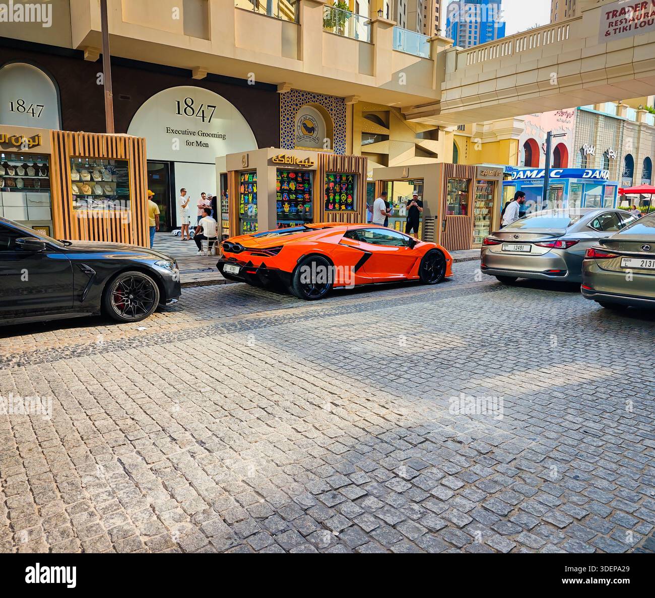 01 08 2026 - Dubai, UAE. Luxury Lamborghini supercar parked on a city street in downtown Dubai, urban lifestyle and modern city background Stock Photo