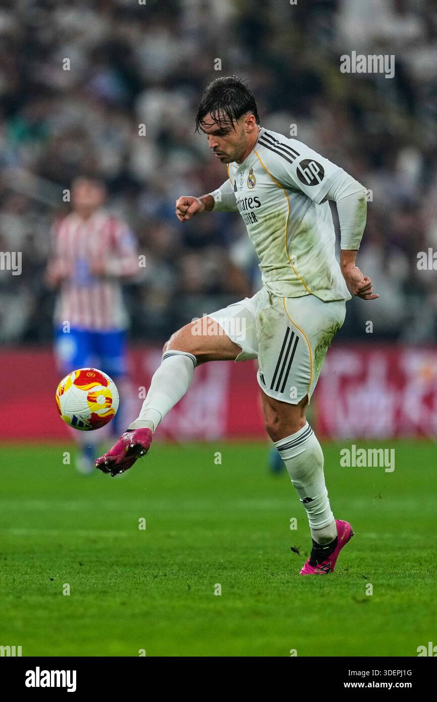 Real Madrid's Raul Asencio controls the ball during the Spanish Super ...