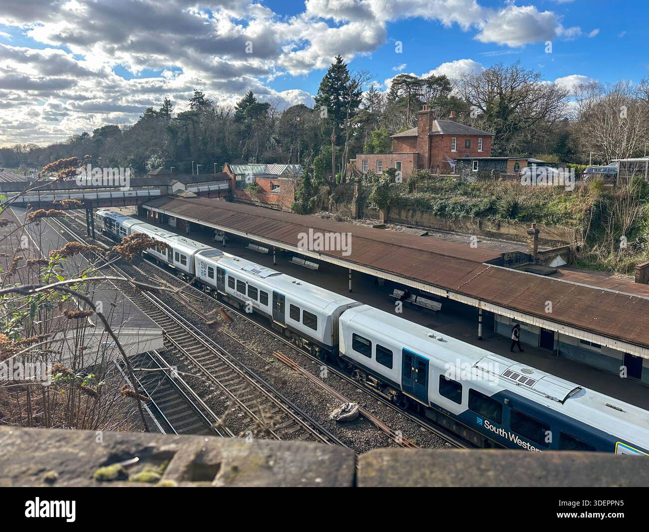 Swr Train Track South Western Railway (SWR) train at Weybridge station platform, Surrey ...