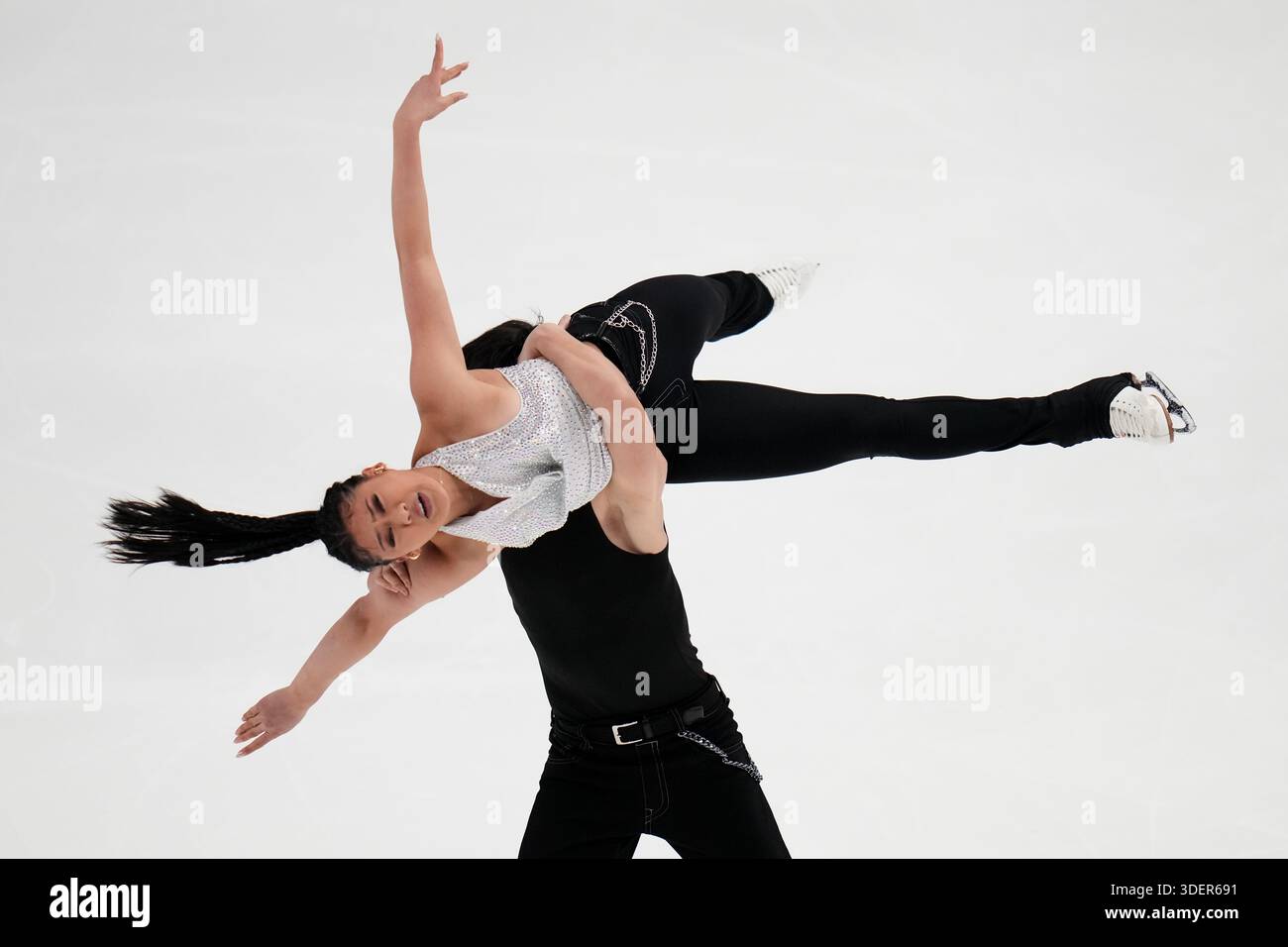 Amy Cui and Jonathan Rogers compete during the ice dance competition at ...