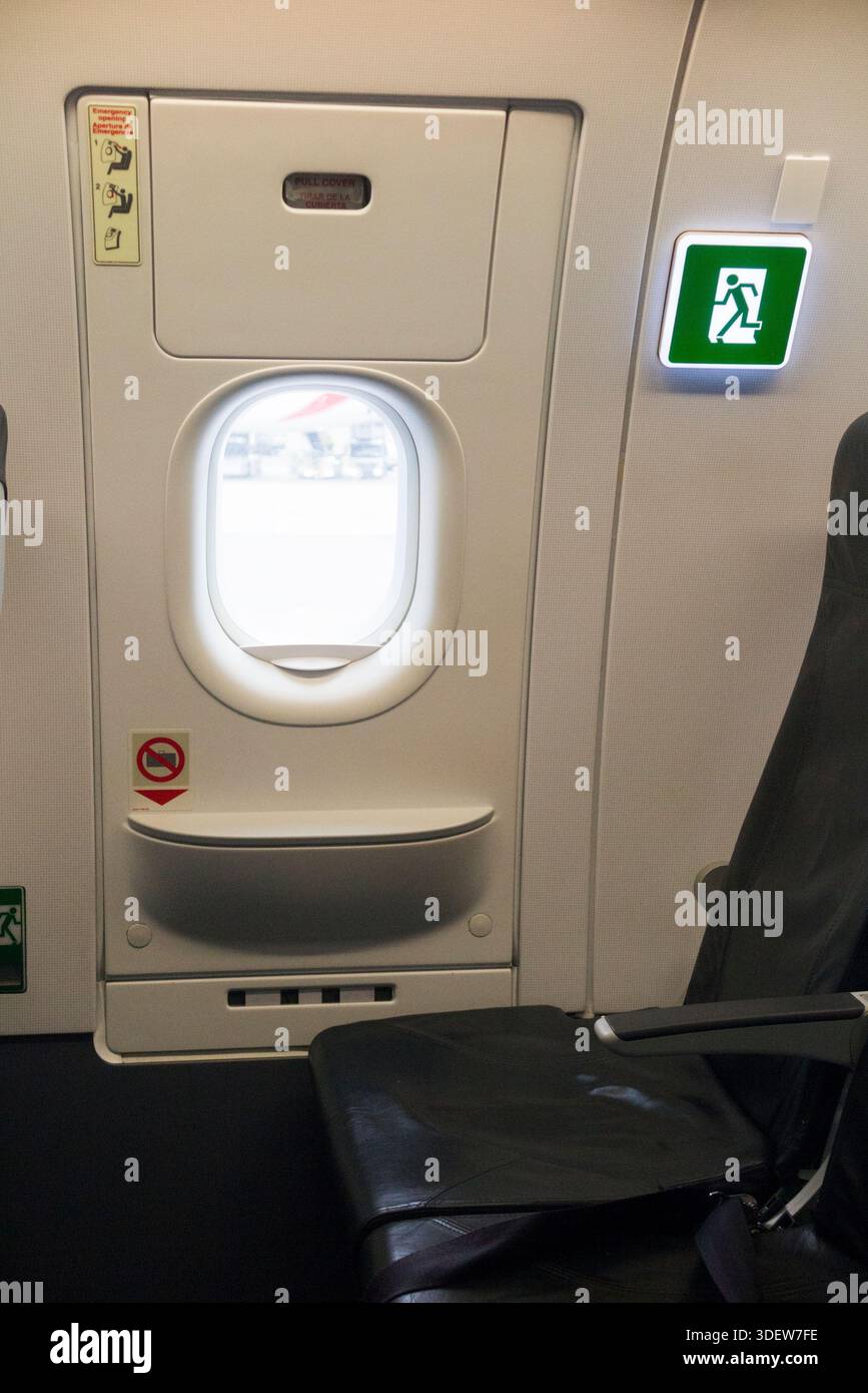 Exit row emergency exit door, to alight (and emergency escape) from the ...