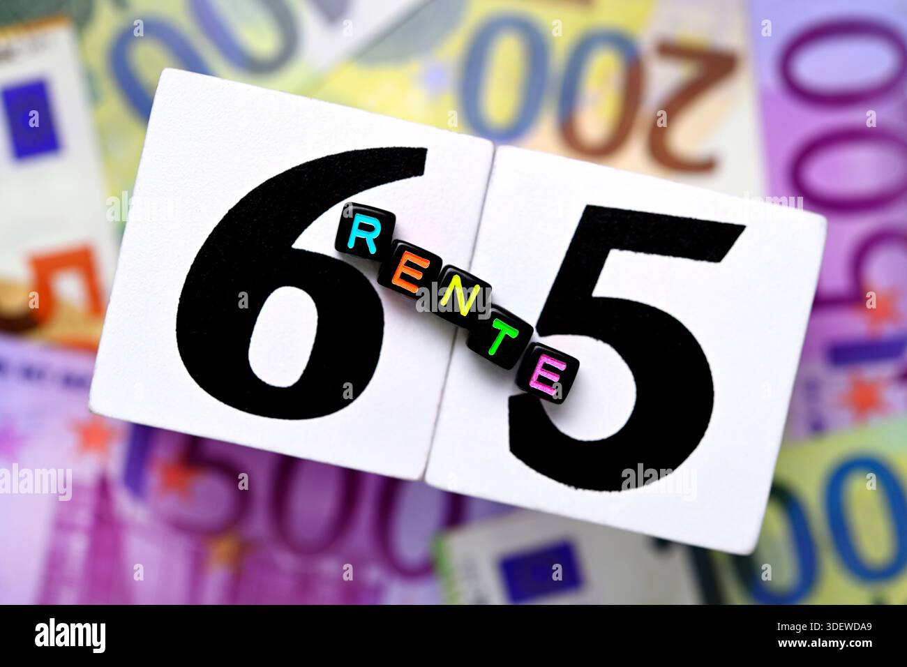 65 Lettering Cube letters form the lettering Retirement on the number 65, symbol ...