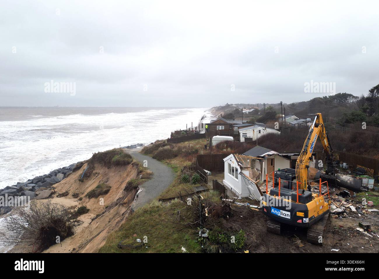 Properties being demolished close to the cliff edge at Hemsby in ...