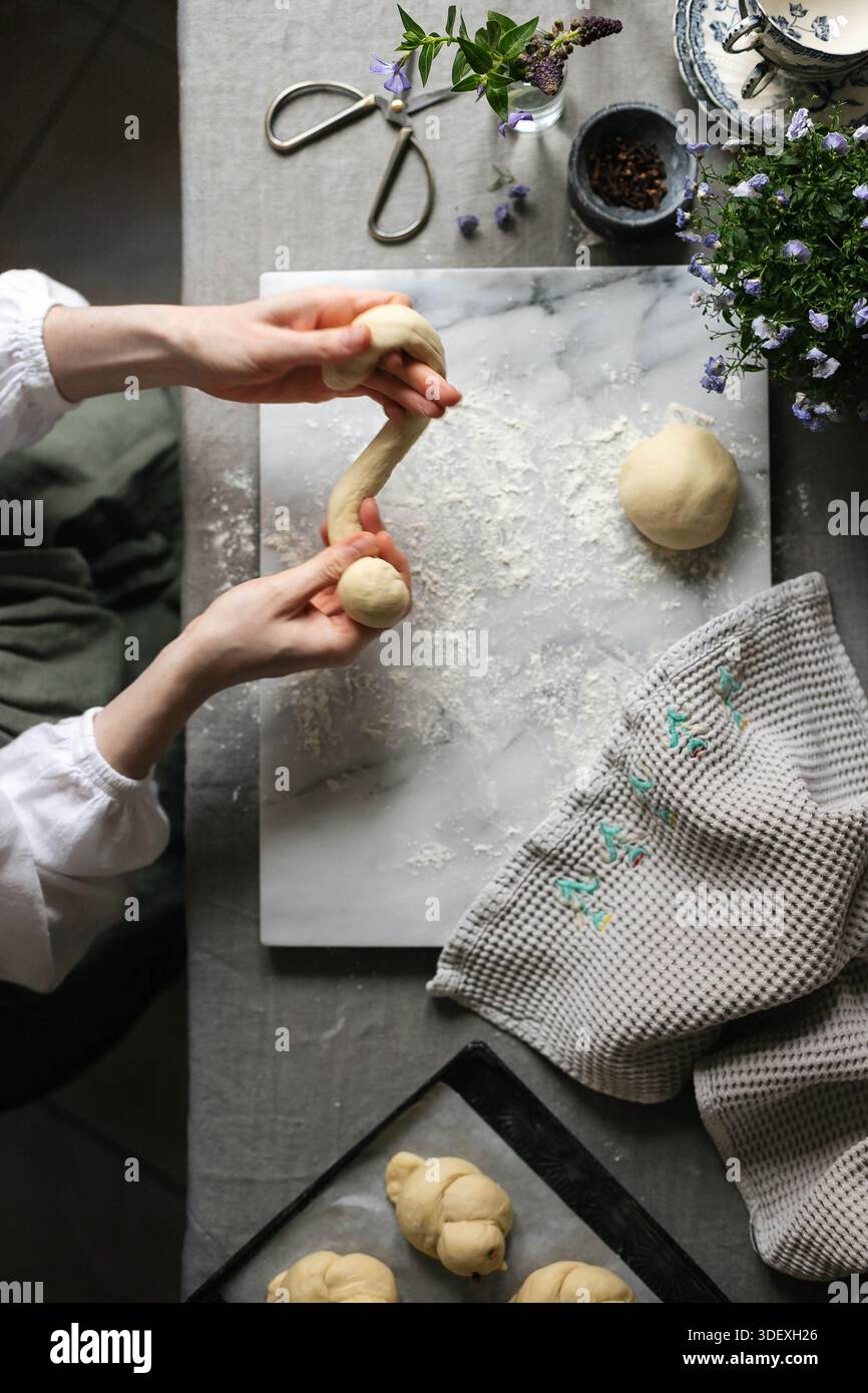 Sour dough making process. Hands in frame. Stock Photo