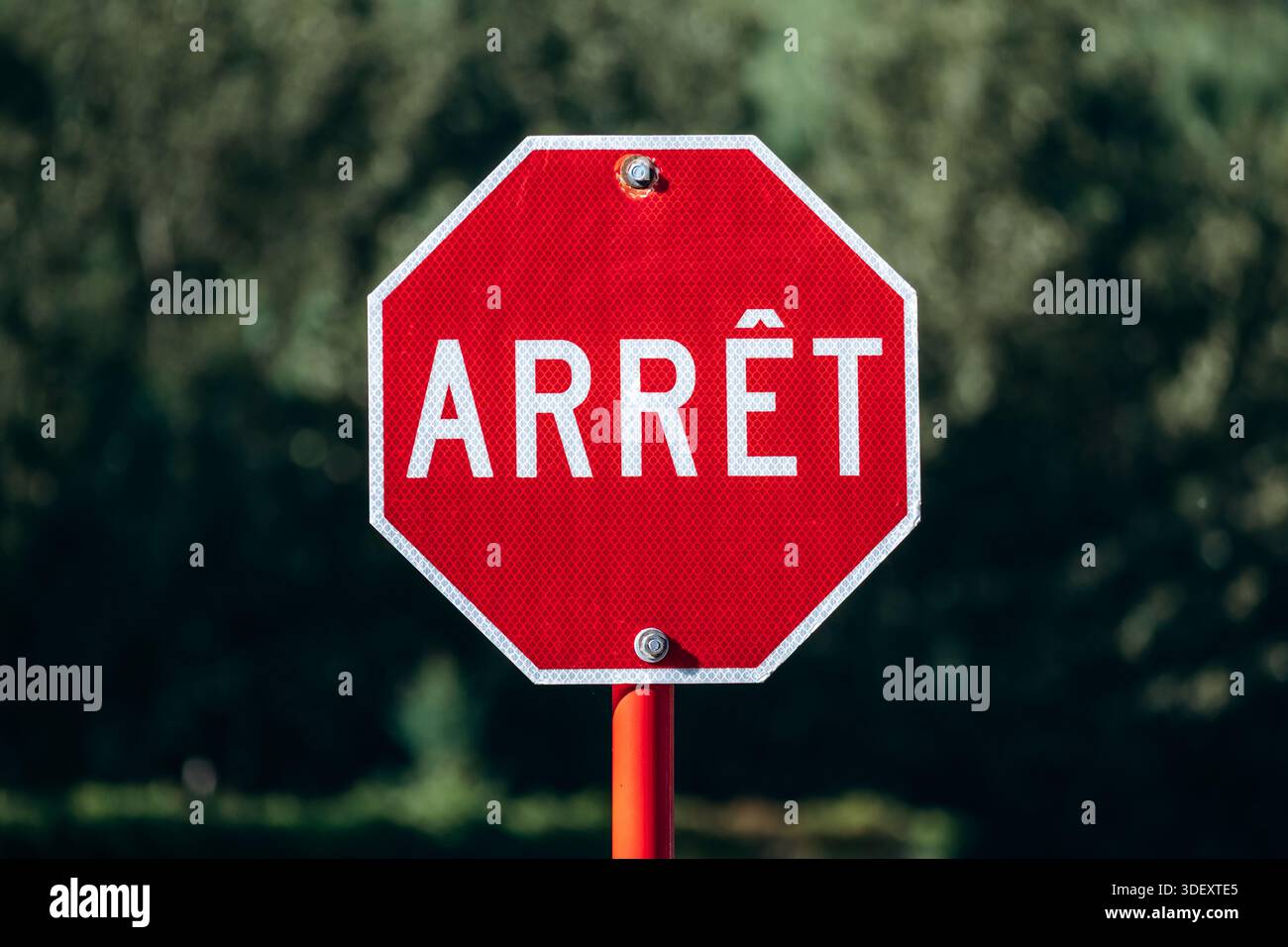 Quebec French ARRET stop sign at Val-Jalbert Historical Village ...