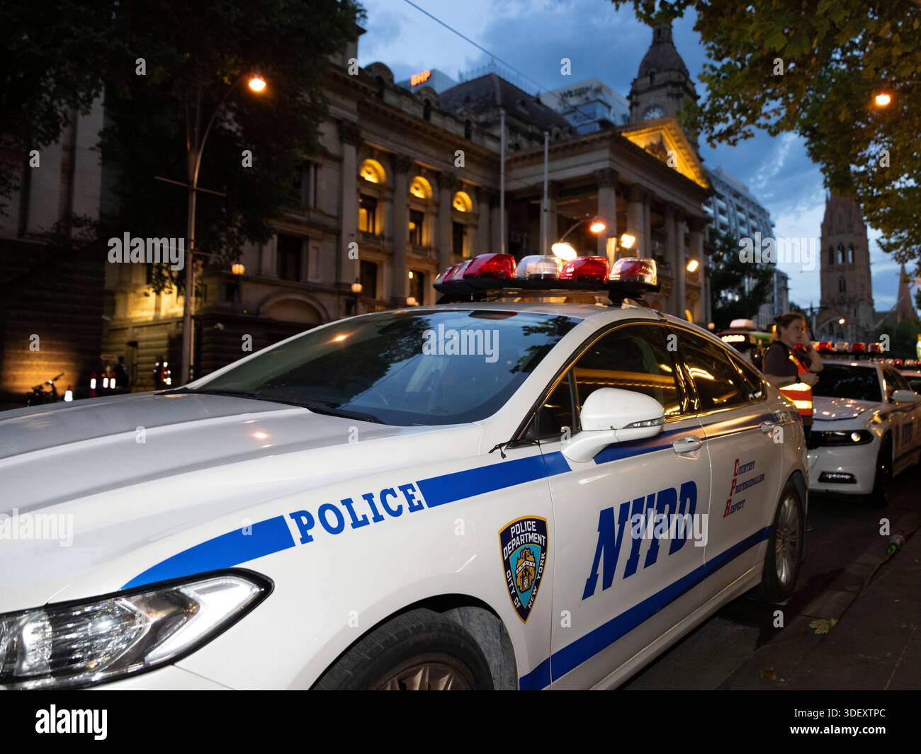 A NYPD patrol car seen parked outside of the town hall during filming ...