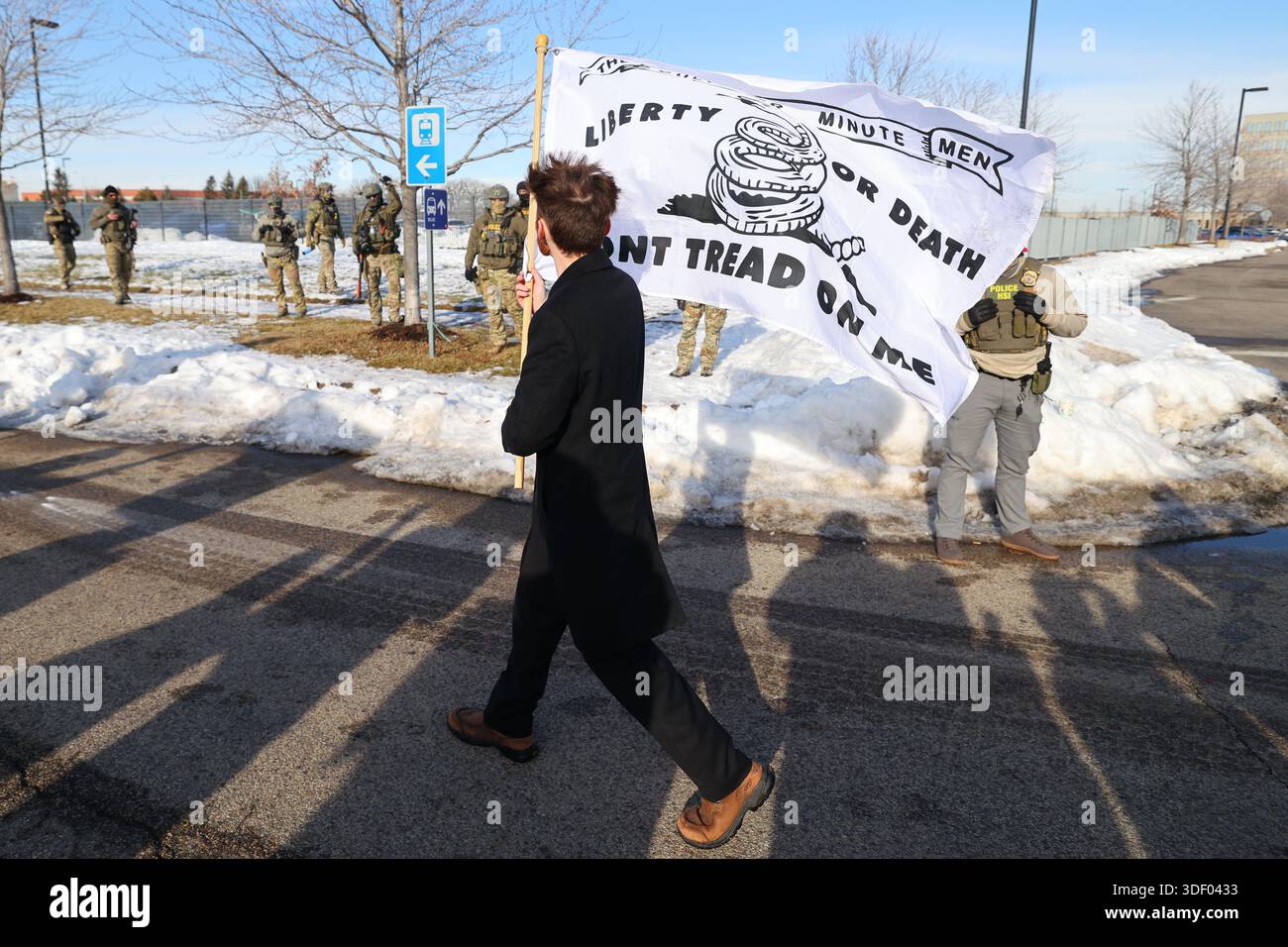 A supporter of United States Immigration and Customs Enforcement holds ...