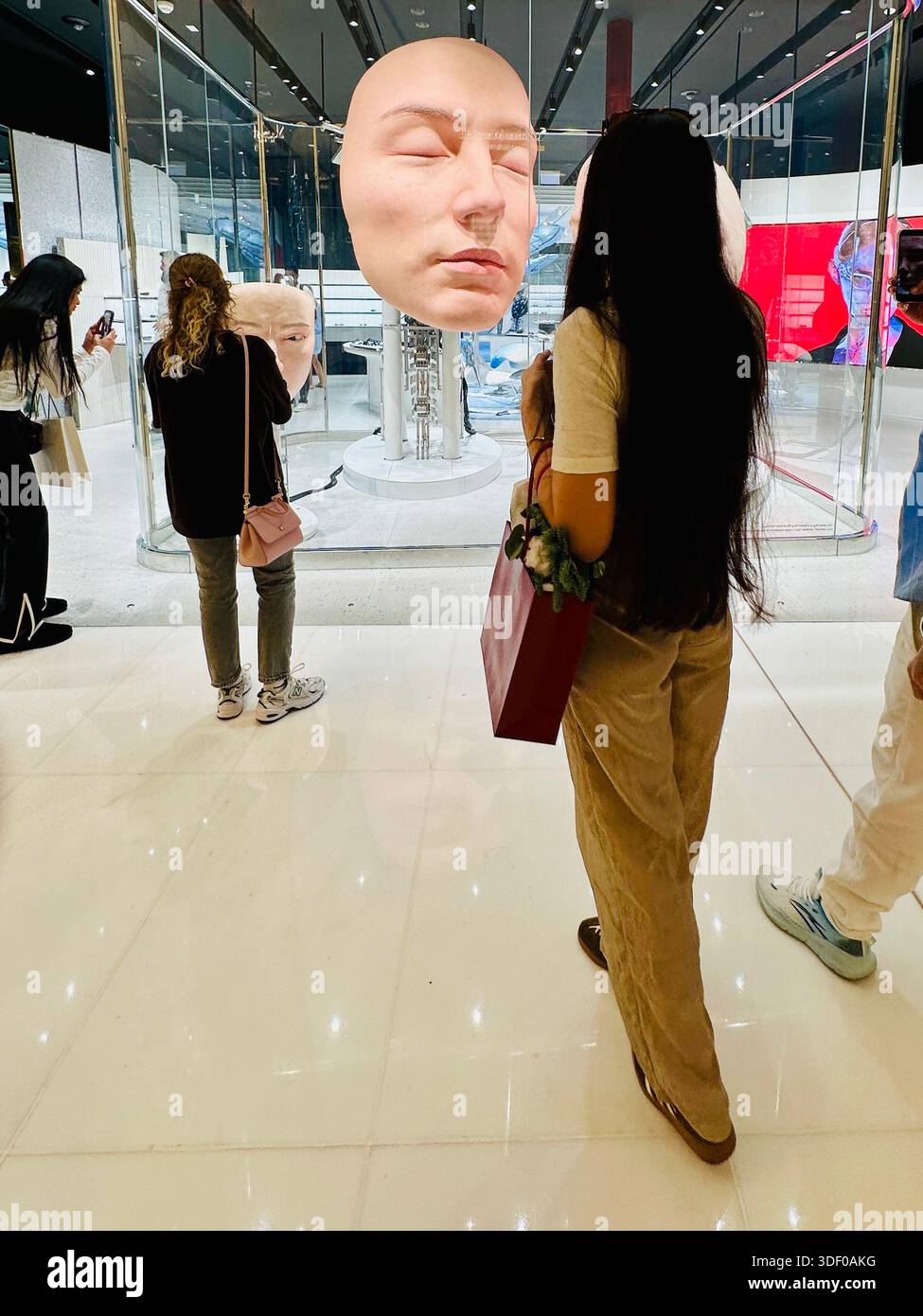 Gentle Monster robot face display - Smartphone Captured Stock Image