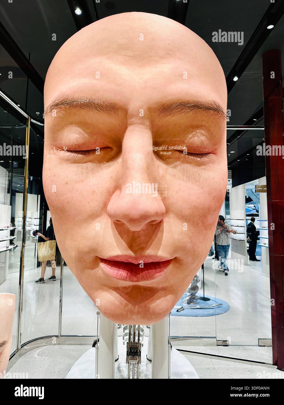 Gentle Monster robot face display - Smartphone Captured Stock Image