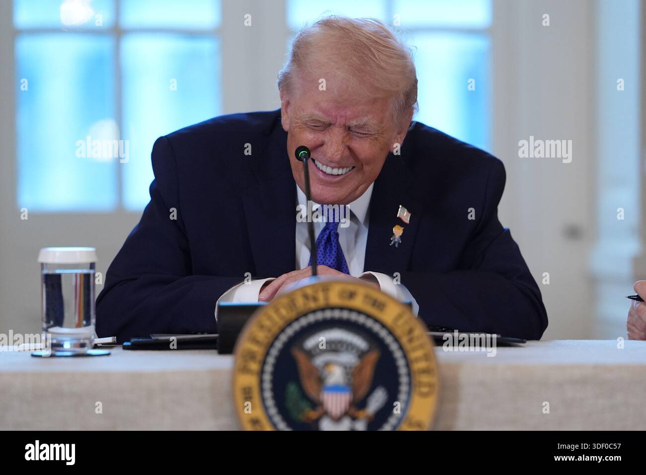 President Donald Trump smiles during a meeting with oil executives in ...
