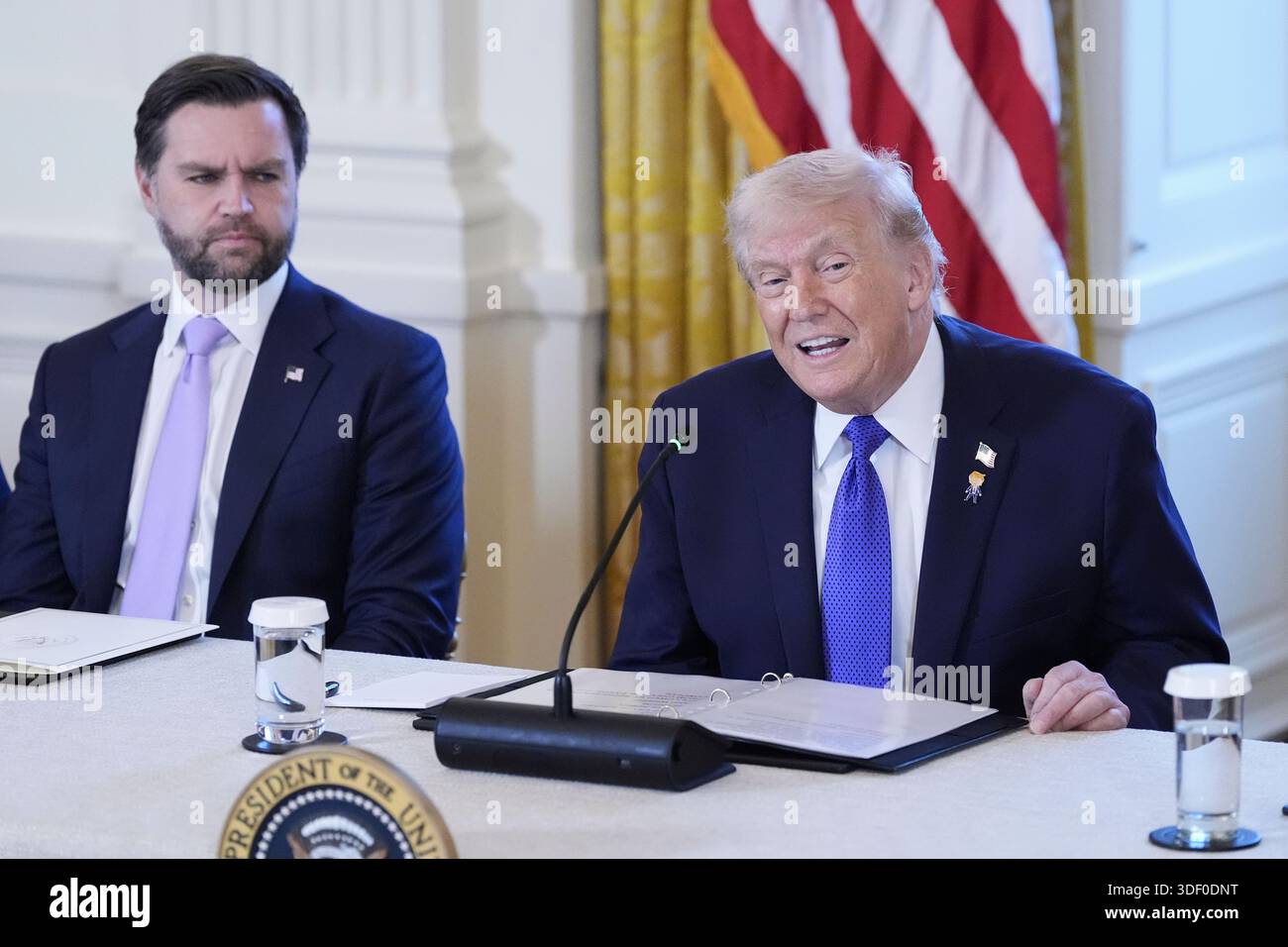 President Donald Trump speaks during a meeting with Vice President JD ...