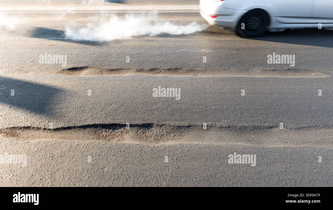 Rut on asphalt road in city, substandard asphalt, Road requiring repair ...