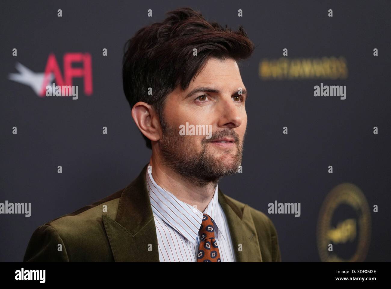 Actor Adam Scott arrives at the AFI Awards on Friday, Jan. 9, 2026, at ...