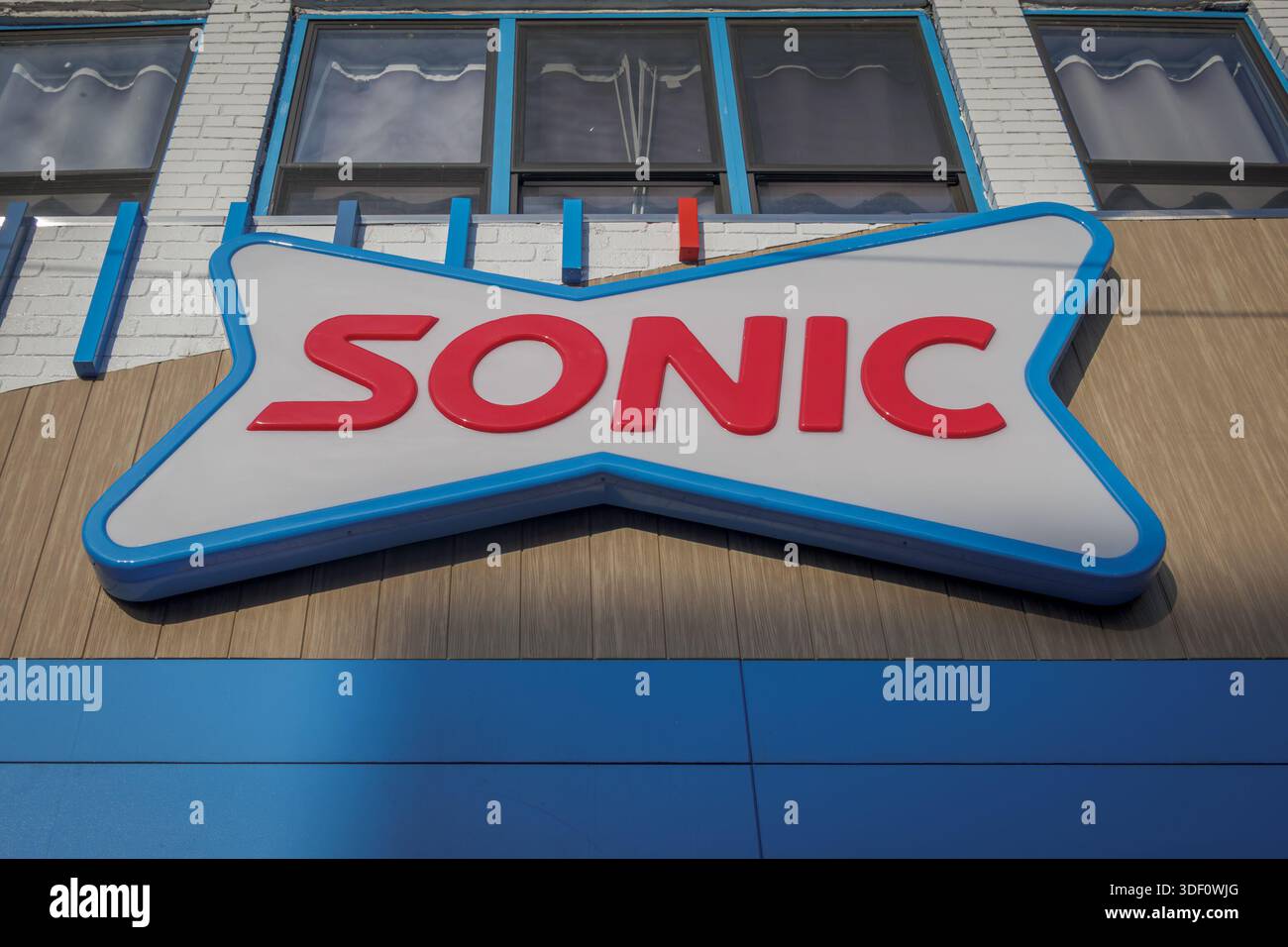 Sign at the entrance to a Sonic store in Manhattan. (Photo by Erik ...