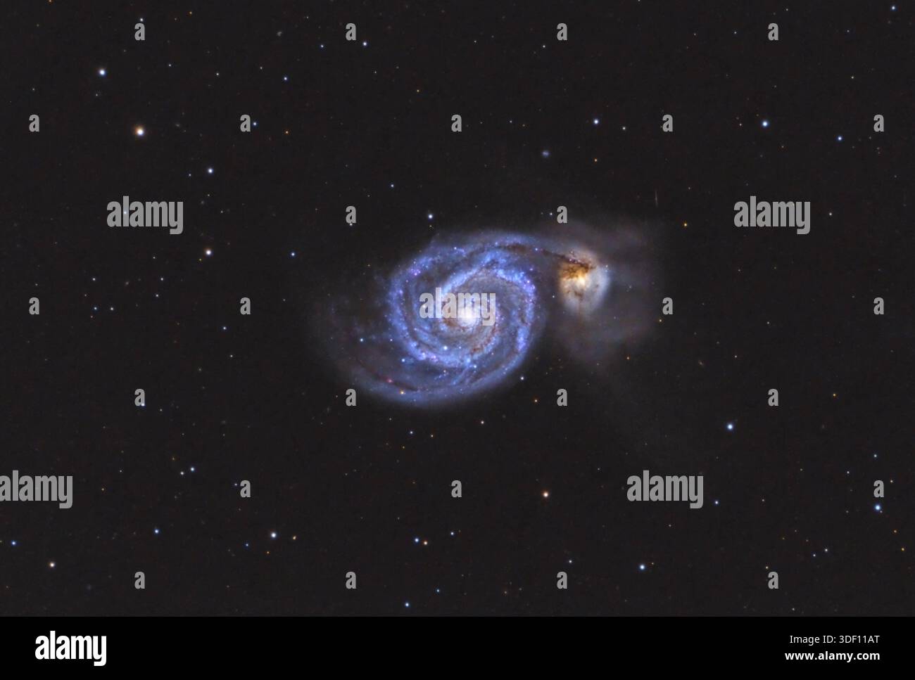 M 51 Whirlpool Galaxy group in Canes Venatici. Deep space photograph of ...