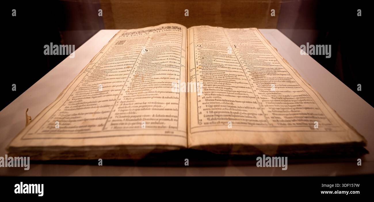 Historic bible opened to Proverbs, Parable of Solomon, displayed in a ...